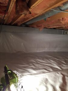 A crawl space vapor barrier is a thick piece of plastic placed over the crawl space floor and walls.