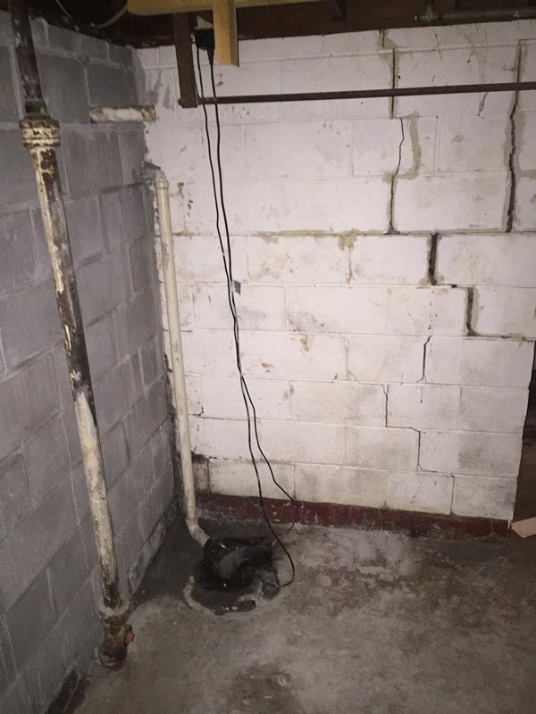 Cinder block repair might involve removing and replacing damaged blocks, installing steel I-beams or carbon fiber straps, and installing a drain tile system.