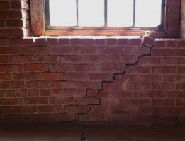 structural crack - stairstep crack in brick wall