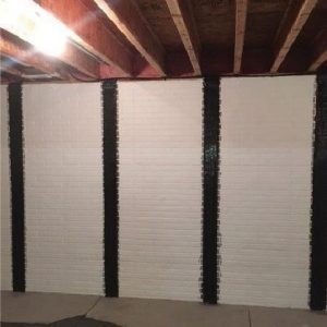 Carbon fiber straps on basement wall